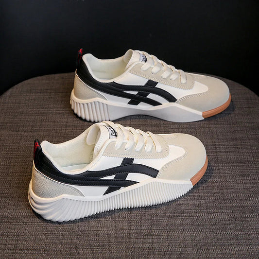 Platte witte hardloopschoenen