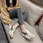 Platte witte hardloopschoenen
