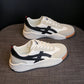 Platte witte hardloopschoenen