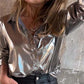 Dameshemd met glanzend metallic lederen knoopsluiting