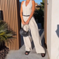 🩷Dames halternek jumpsuit met diepe V-hals en wijde pijpen🌸