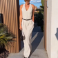 🩷Dames halternek jumpsuit met diepe V-hals en wijde pijpen🌸