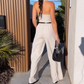 🩷Dames halternek jumpsuit met diepe V-hals en wijde pijpen🌸