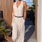 🩷Dames halternek jumpsuit met diepe V-hals en wijde pijpen🌸