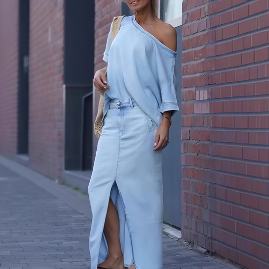 ✨ Conjunto para la oficina y el día a día – Blusa asimétrica con hombro descubierto + Falda larga de mezclilla con abertura + Bolso tejido | ¡Look completo con estilo y comodidad