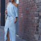 ✨ Conjunto para la oficina y el día a día – Blusa asimétrica con hombro descubierto + Falda larga de mezclilla con abertura + Bolso tejido | ¡Look completo con estilo y comodidad