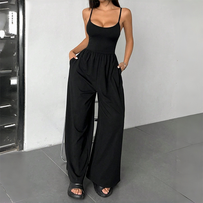 🌸 Jumpsuit met spaghettibandjes, wijde pijpen en zakken – moeiteloos chic en comfortabel in één ✨💖